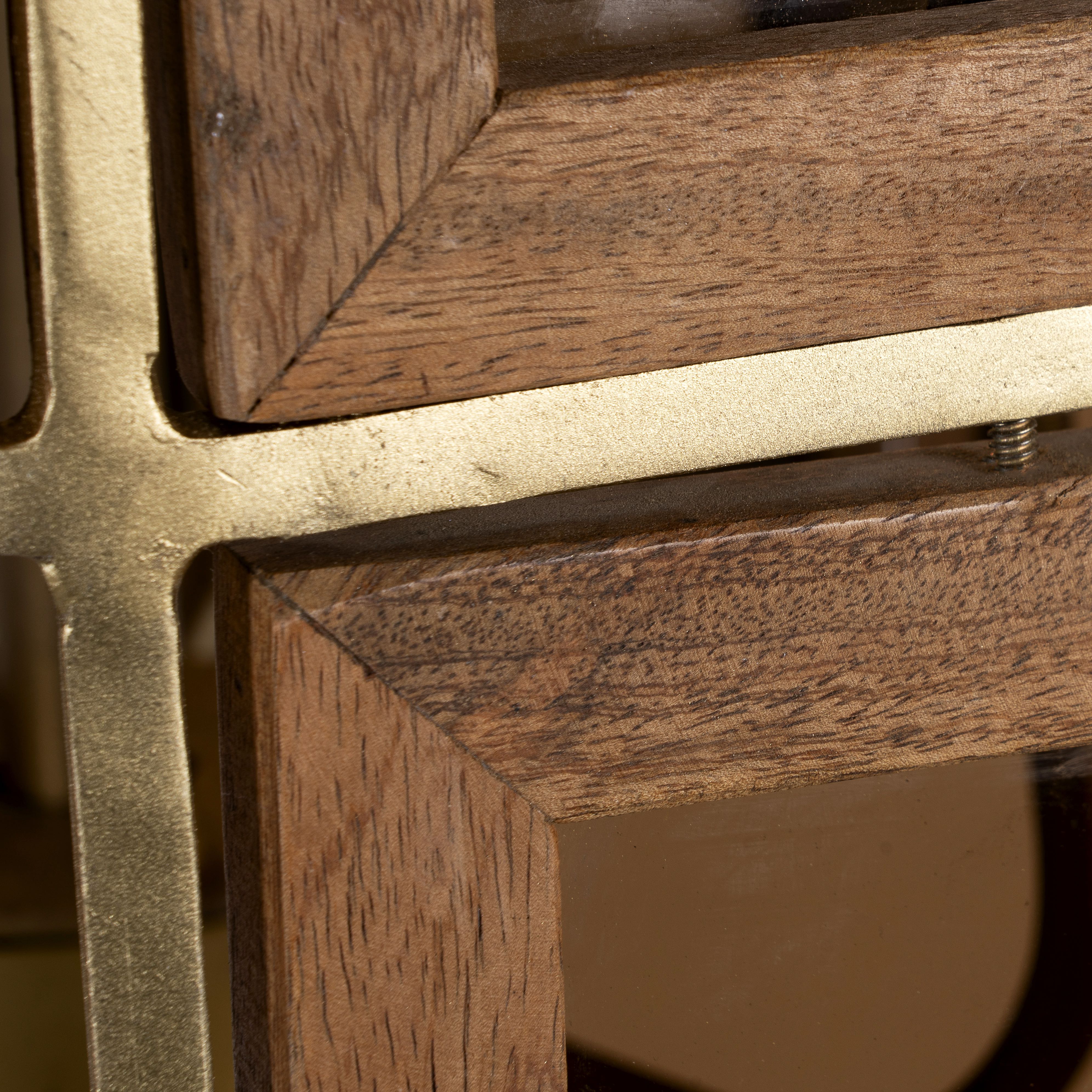 Close up image of a octagon-shaped wooden pendant lamp with antique brass accents – handcrafted wooden lamp for industrial style lighting in dining or living spaces.