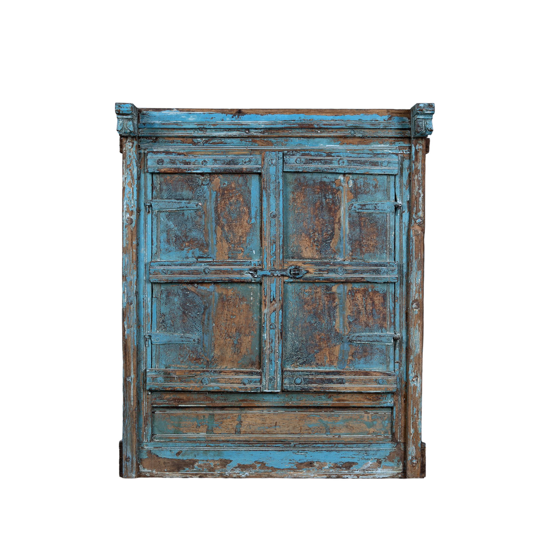 Antique mirror crafted from an old blue teak wood window with original shutters and detailed hand carvings.