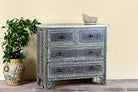 Side angle image of a of a hand-painted Indian chest of drawers made from recycled wood – unique furniture featuring colourful motifs and antique craftsmanship.