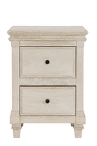 White background image of a whitewashed nightstand made of mango wood with Mediterranean-style carved detailing and one drawer – Kirandeep bedside table by Om Home & Garden