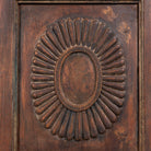 Close up image of a reclaimed teak wood display cabinet with glass doors – unique Indian furniture with natural wax finish and timeless craftsmanship.