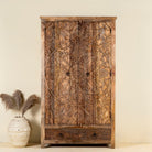 Mango wood wardrobe with hand-carved floral detailing, Indian carved wooden furniture with bottom drawer, 105 × 40 × 180 cm.