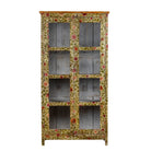 White background image of a hand-painted reclaimed wood showcase cabinet with floral motifs and glass doors, sustainable furniture and vintage home decor style, 95 × 48 × 183 cm.