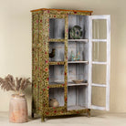 Open door image of a hand-painted reclaimed wood showcase cabinet with floral motifs and glass doors, sustainable furniture and vintage home decor style, 95 × 48 × 183 cm.
