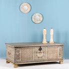 Side angle image of a hand-painted reclaimed wood chest box with Indian motifs – vintage home decor and versatile storage with coffee table function.