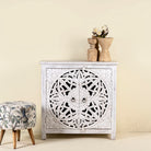 White carved wood cabinet made from solid mango wood with hand-carved Indian motifs, 90 × 90 × 40 cm.