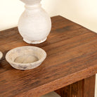 Close up picture of a Indian coffee table made from reclaimed hardwood, a bold and timeless piece of unique wooden furniture.