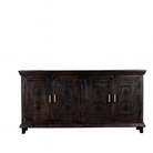 White background image of a handcrafted wood carved sideboard in black mango wood with four doors, versatile for bedroom furniture or living spaces, 180 × 40 × 90 cm.