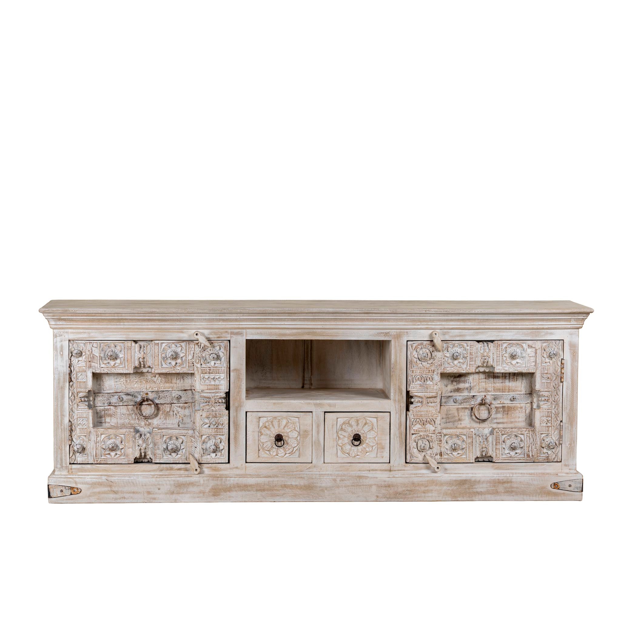 White background picture of a ow board made from reclaimed teak wood door panels, featuring detailed carvings, iron ring handles, and ample storage space in a whitewashed vintage finish.