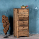 Side view image of a Wabi-Sabi style chest of drawers crafted from recycled old wood, featuring six drawers with a natural, weathered driftwood finish and visible wood grain variations.


