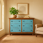Hand-carved mango wood chest of drawers Safita with distressed blue finish and iron fittings, boho style living room furniture, 140 × 42 × 100 cm.