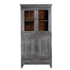 White background image of a shabby chic grey teak wood cabinet with glass doors and drawers – sustainable furniture for classic, rustic, or vintage interiors.