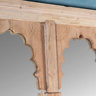 Close up picture of a large arched teak wall mirror in Boho style, repurposed from antique double window frame, part of our vintage furniture collection.