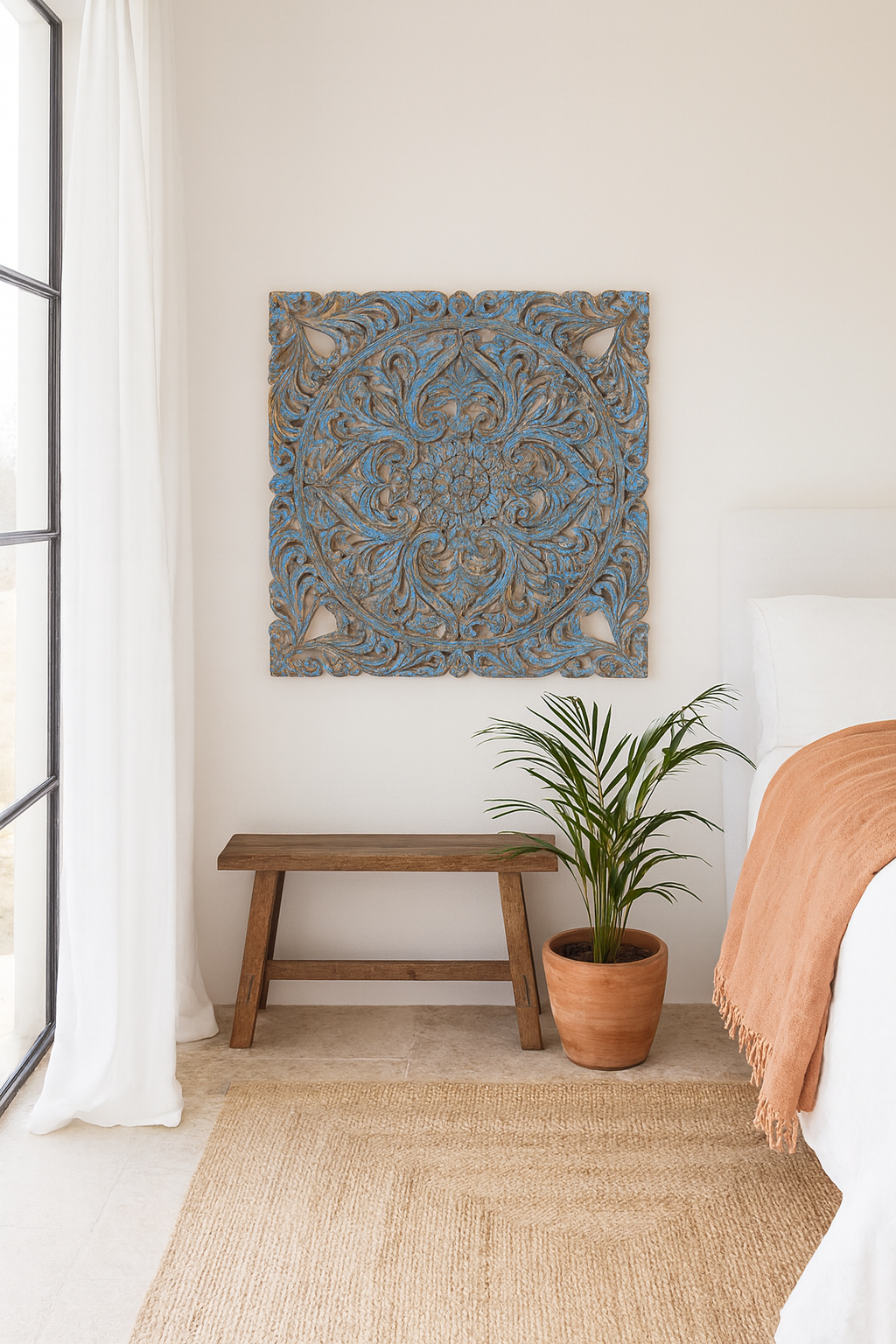 Lifestyle image of a Shay carved wooden wall panel made from mango wood with soft floral hand-carving—an artisan wooden wall decoration with natural beauty and handcrafted detail.