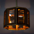 Octagon-shaped mango wood pendant lamp with antique brass finish – handcrafted wooden lamp ideal for industrial style lighting in compact interiors.