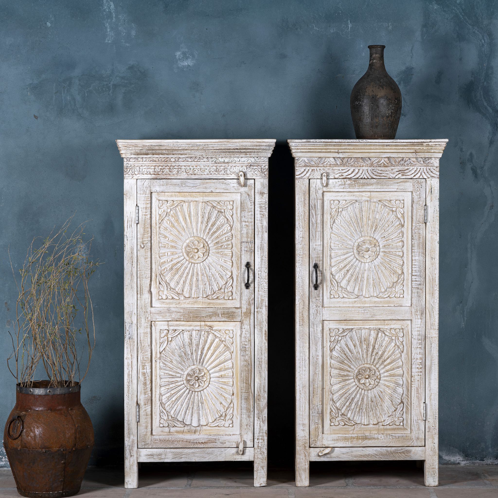 White washed wood cabinet with hand-carved floral design, Moroccan-style reclaimed wood furniture, 134 × 60 × 45 cm.