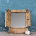 Open shutter image of an antique Indian teak window mirror with shutters, vintage wall panel style, part of our vintage home accessories collection.
