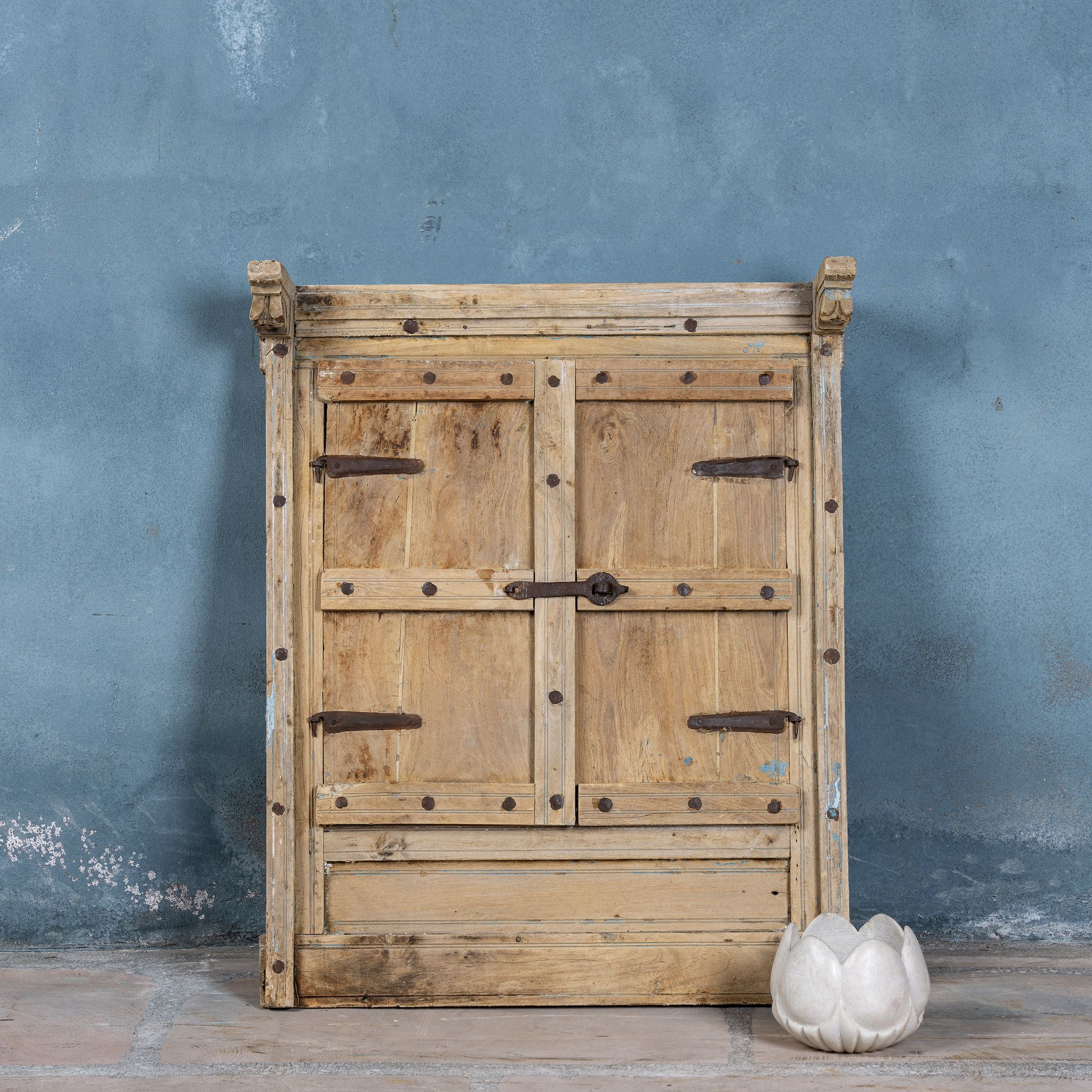 Antique window mirror crafted from an old teak wood window with original shutters and detailed hand carvings. Natural sandblasted.