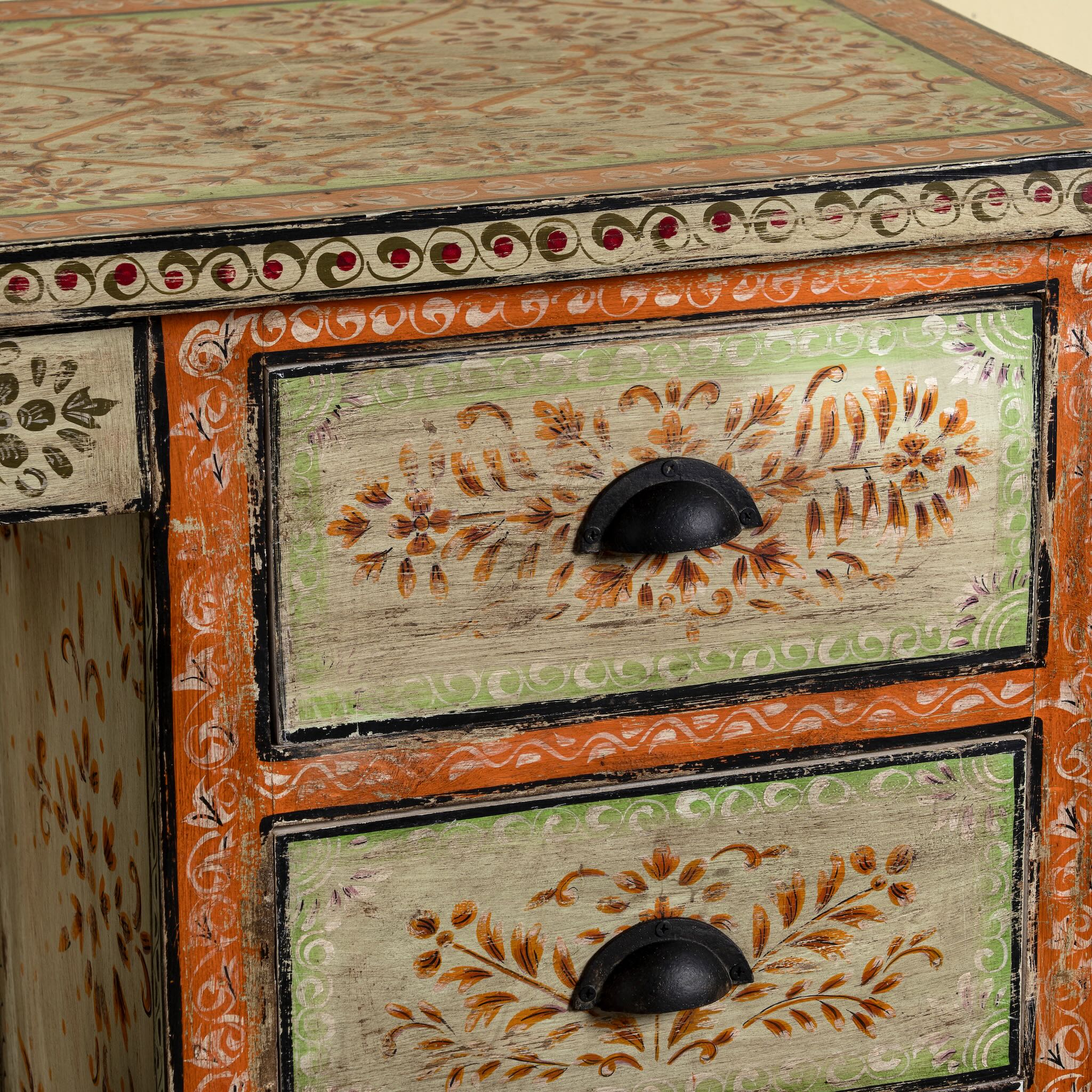 Close up image of a hand-painted desk made of reclaimed wood with floral detailing – Tejasvini model by Om Home & Garden