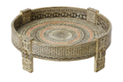 White background image of a reclaimed wood coffee table made from antique teak oil press with hand-painted Sanskrit symbols and glass top; hand painted coffee table, 75 cm diameter, 25 cm height.