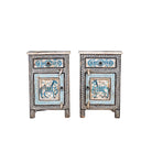 White background image of a set of two hand painted night stands with floral and horse motifs; sustainable furniture made of reclaimed wood, 45 × 35 × 70 cm.