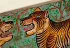 Close up image of a Virat hand painted wall panel featuring a vibrant tiger motif on reclaimed antique teak wood—an artisan-crafted tiger wall decoration blending history and bold artistry.