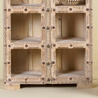 Close up image of a reclaimed teak wood shelving unit with 10 compartments and iron fittings – sustainable furniture combining practicality, style, and handcrafted quality.