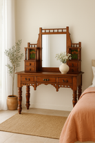 Lifestyle imagination of a antique console table with mirror, restored teak wood, featuring hand-carved detailing; dressing table with mirror, 110 × 48 × 146 cm.