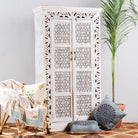 Yuvraj, white wooden cupboard