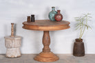 Round solid wood dining table made from reclaimed teak with carved pedestal base; rustic reclaimed teak wood dining table, 100 cm diameter × 78 cm height.