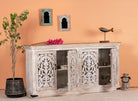 Open door image of a Hand carved mango wood sideboard with whitewashed finish and intricate Indian patterns; ideal for bedroom furniture or as a hand carved sideboard, 180 × 90 × 40 cm.