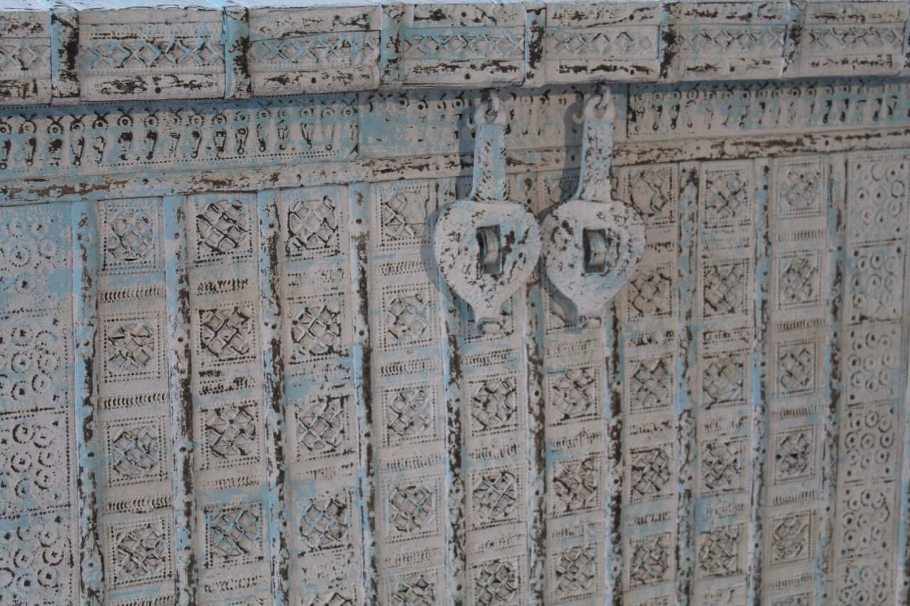 Close up image of a antique Indian chest in blue with brass fittings – solid teak iron fitted wooden chest ideal for storing blankets, pillows, or decorative use.