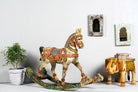 Hand-painted mango wood rocking horse “Gita” in Rajasthani style – colourful Indian home accessory and mango wood decor piece, 104x78x30cm.