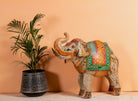 Handcrafted metal elephant sculpture with painted finish – a unique painted metal decoration perfect for vintage home decor and artistic interiors.