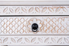 Close up image of a carved mango wood console table with floral ornamentation; rich, exotic mango wood furniture, 150 × 90 × 45 cm.