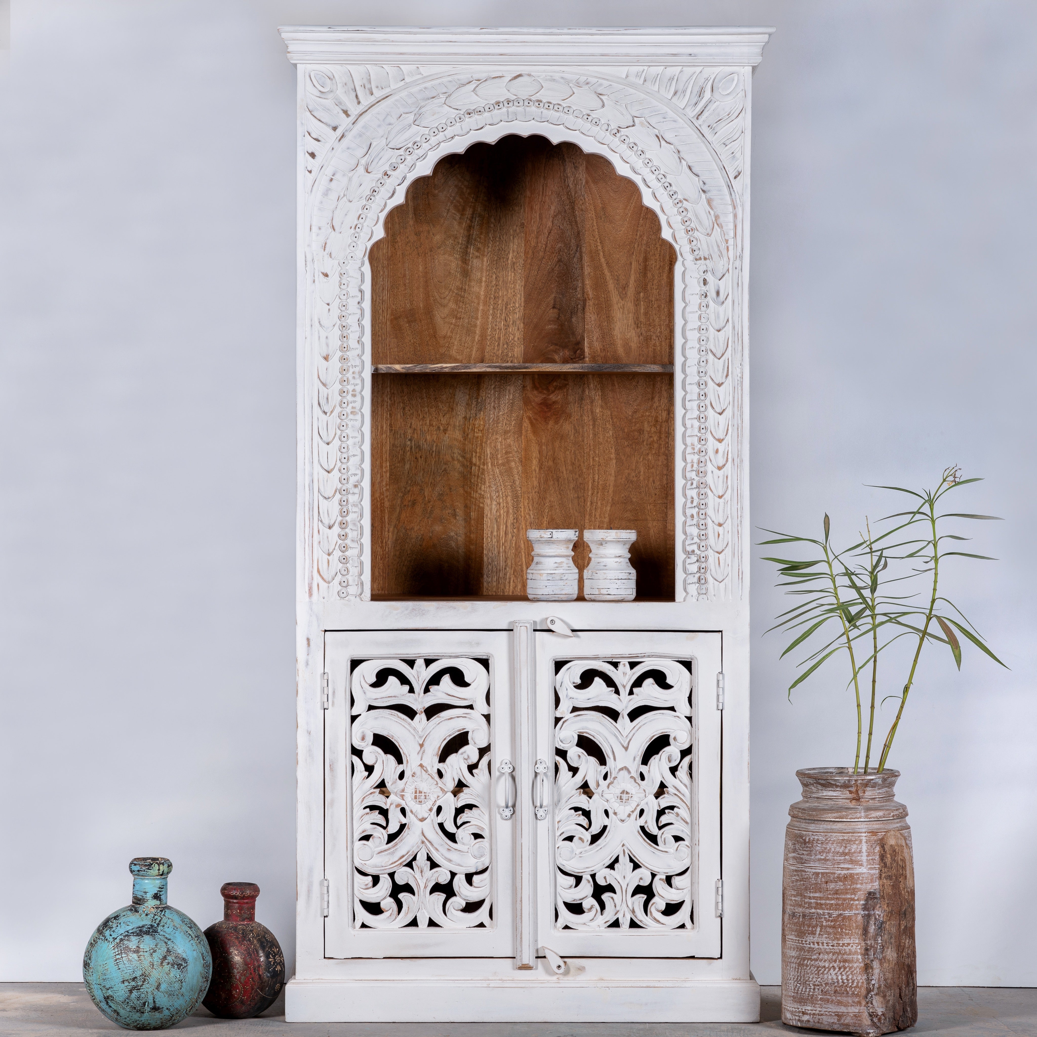 Handcrafted mango wood shelving unit with Indian carvings and four compartments; ideal for Indian home decor, 180 × 90 × 40 cm.