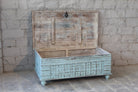 Antique Indian chest coffee table in blue with brass fittings – solid teak iron fitted wooden chest repurposed as living room table with storage.