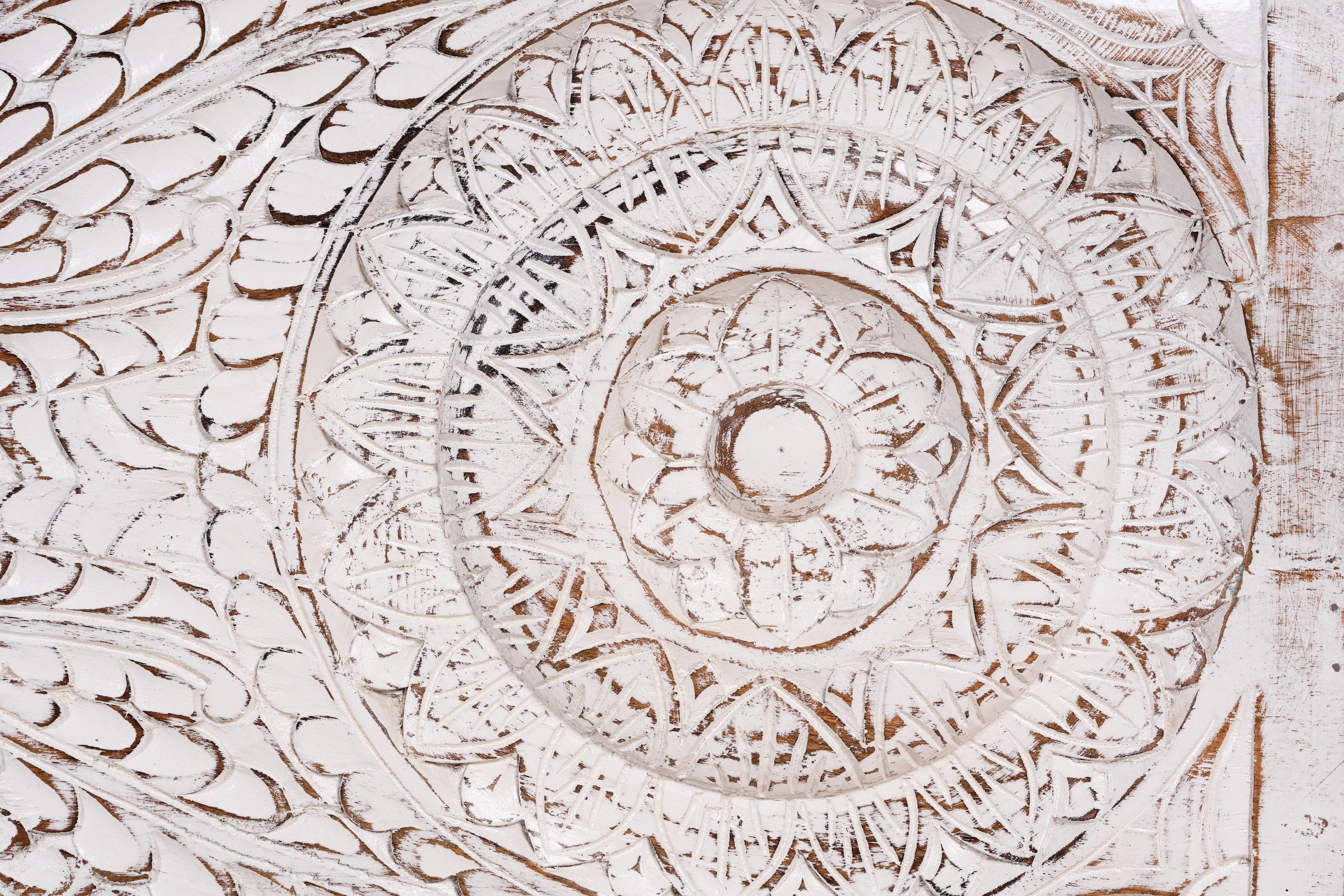 Close up image of a long mango wood vintage display box and wood chest box with hand‑carved circular motifs, iron fittings and whitewashed finish; 180 × 55 × 46 cm.