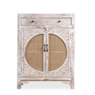 White background image of a white‑washed mango wood cupboard with rattan door panels and hand‑carved Indian ornamentation, 80 × 40 × 104 cm.